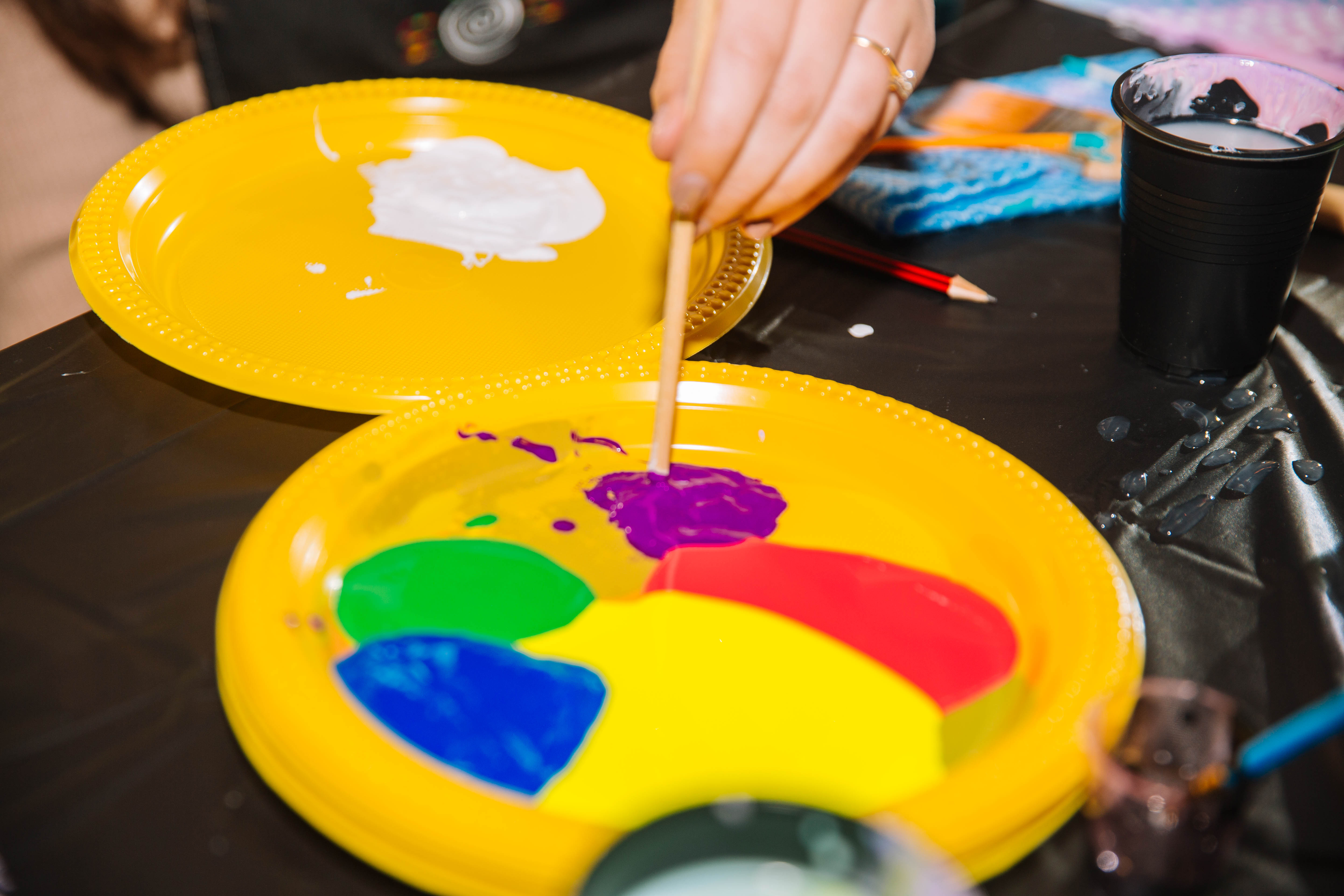 A palette with a range of paint colours.